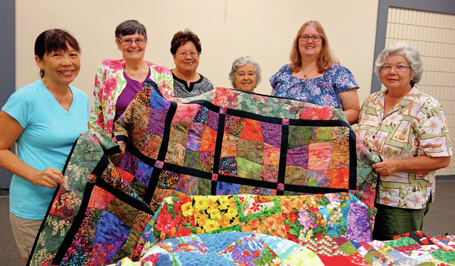 4179192_web1_Becky-and-the-Mauna-Kea-Quilters-crew2016916102227960.jpg