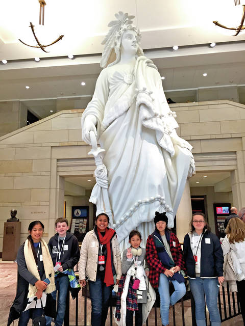 5161833_web1_HPA-middle-school-students-stand-in-the-U.S.-Capitol-Rotunda-in-front-of-a-replica-of-the-Lady-of-Freedom20174513443676.jpg
