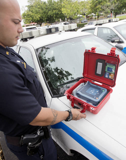 5219243_web1_Police_Cars_with_AED_Machine_2.jpg