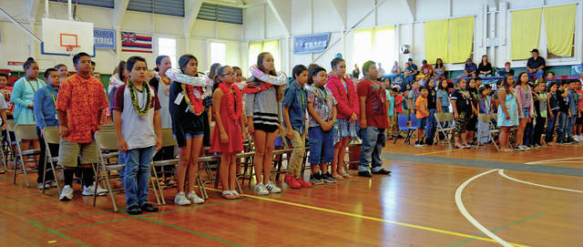 5413454_web1_Ninety-three-Waimea-Elementary-fifth-graders-stand-for-the-opening-of-their-Promotion-Ceremony-Friday-morning-in-Thelma-Parker-Gym2017526123141370.jpg