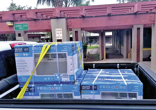 5543709_web1_Air-conditioning-units-delivered-to-Waikoloa-Elementary--Midddle-School201762394358594.jpg