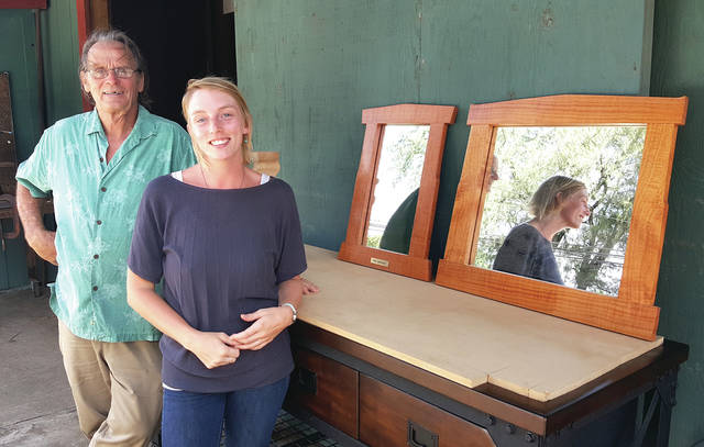 5785540_web1_Hap-Tallman-and-Jenna-Benz-co-founders-of-Old-School-Hawaii-with-mirror-frames-made-at-the-school.201781510120319.jpg
