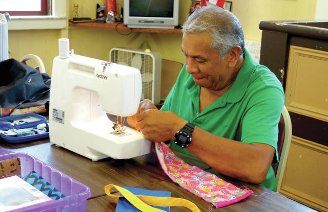 5871107_web1_Tony-Ancheta-is-one-of-three-men-who-joined-Waimea-Senior-Clubs-sewing-class-in-June20179484252129.jpg