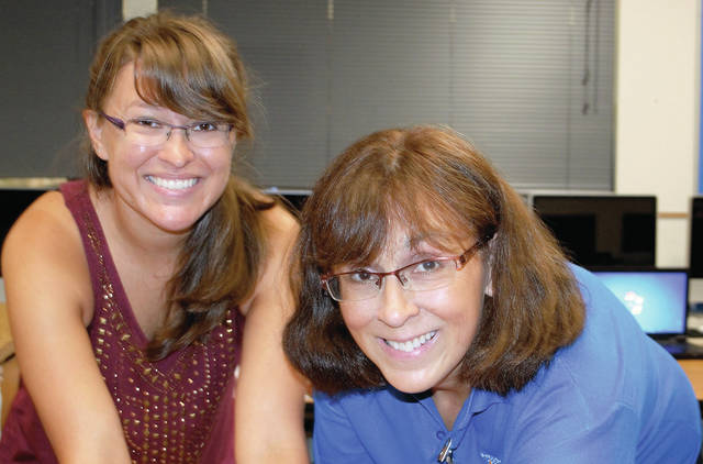 5942185_web1_Renae-Mathson-and-daughter-Moriah--left--of-Project-Vision-Hawaii-coordinated-all-of-the-testing.2017915152826314.jpg