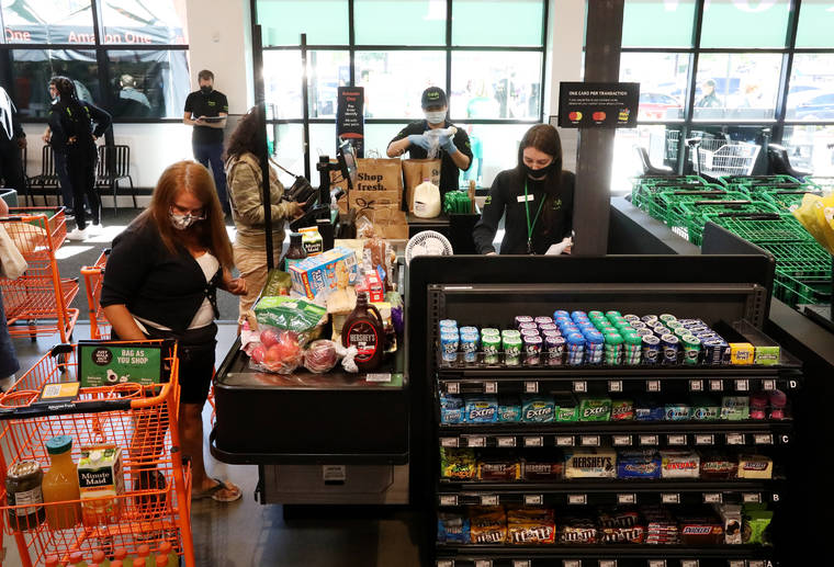 Amazon opens its largest-yet cashierless grocery - West Hawaii Today