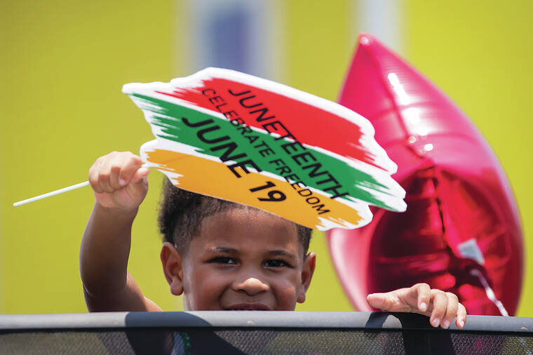 Americans mark with parties, events, quiet reflection on end