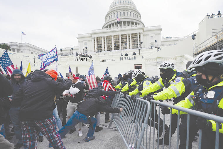 Lawyers argue whether the Constitution’s ‘insurrection’ clause blocks