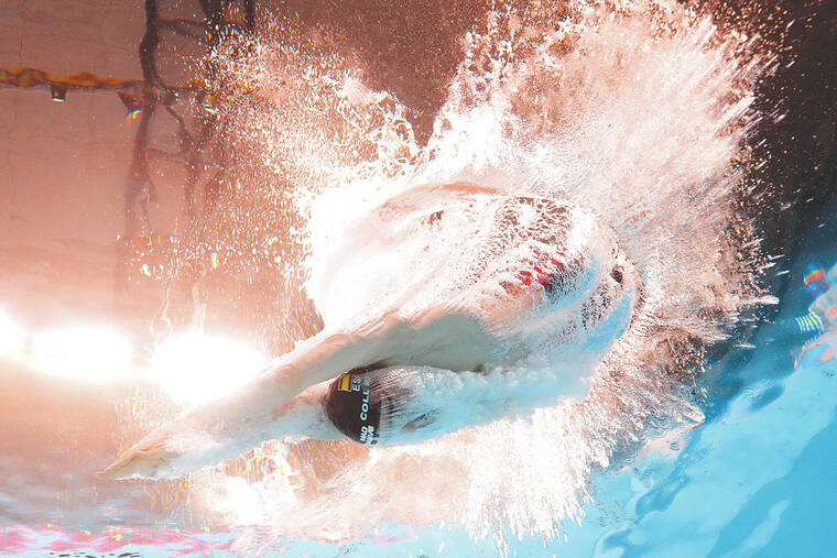 How this AP photographer captured a unique splash at the swimming worlds with an underwater camera