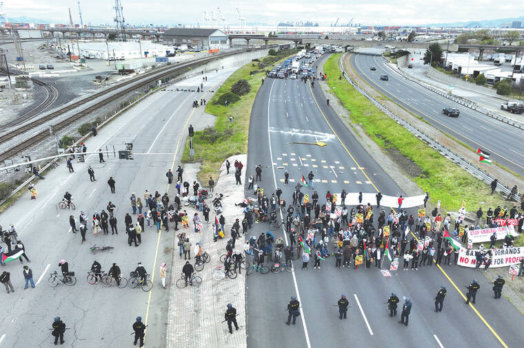 Pro-Palestinian demonstrators shut down airport highways and key bridges in major U.S. cities