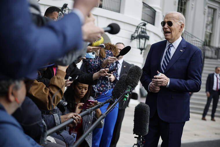 Less than rosy economic numbers dog Biden