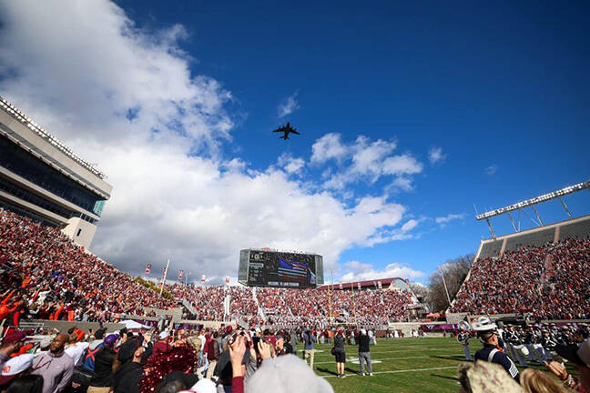 Parachutist rescued after getting stuck on scoreboard at Virginia Tech spring game